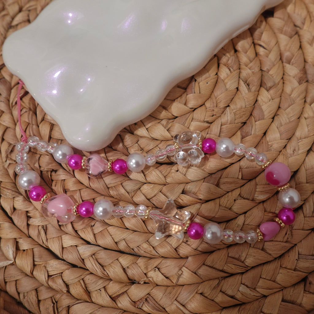 Bright pink/clear phone charm